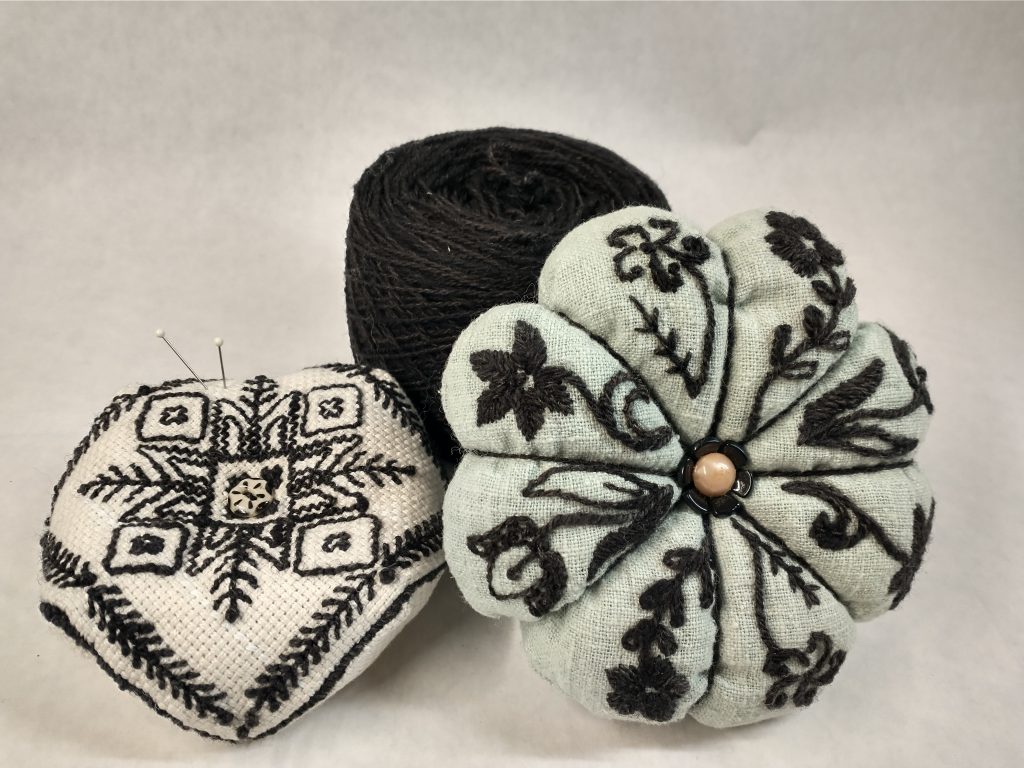 blackwork pin cushions